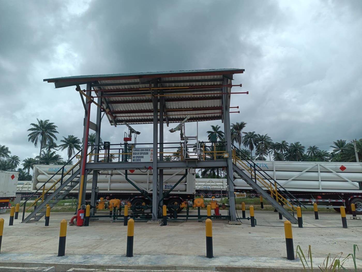 The CNG loading gantry with cylinder trailers behind it at the Apani facility