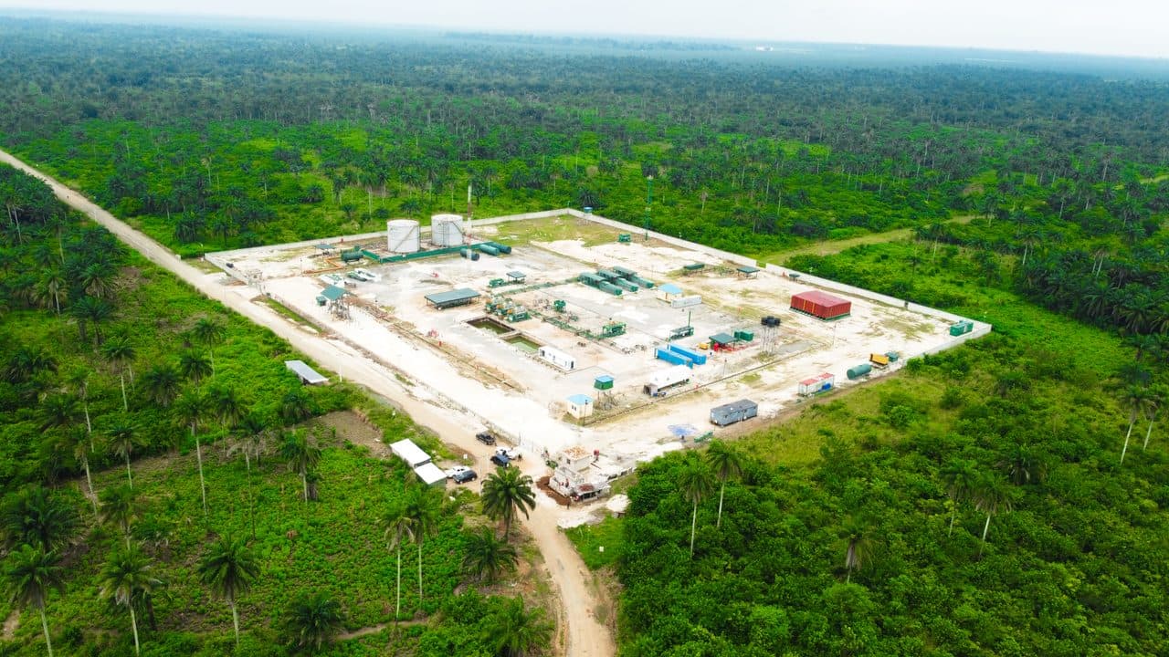 Wide aerial view of the Apani facility surrounded by palm plantation